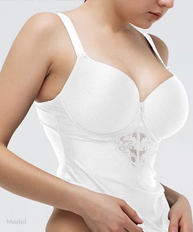 breast Thin woman in white bathing suit